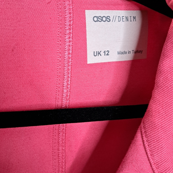 ASOS DESIGN denim zip through jumpsuit in hot Pink - Picture 2 of 3
